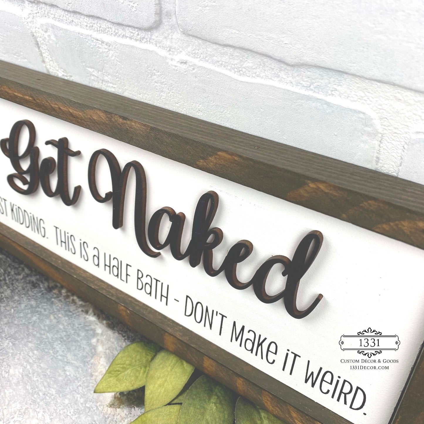 Get Naked, Just Kidding sign