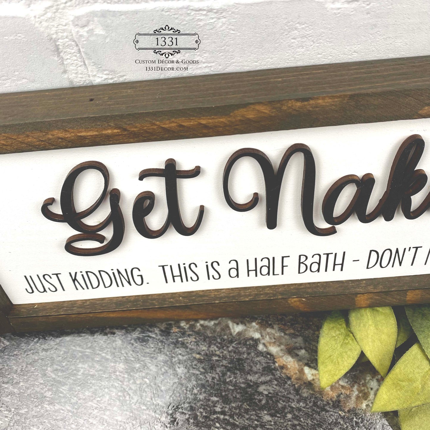 Get Naked, Just Kidding sign
