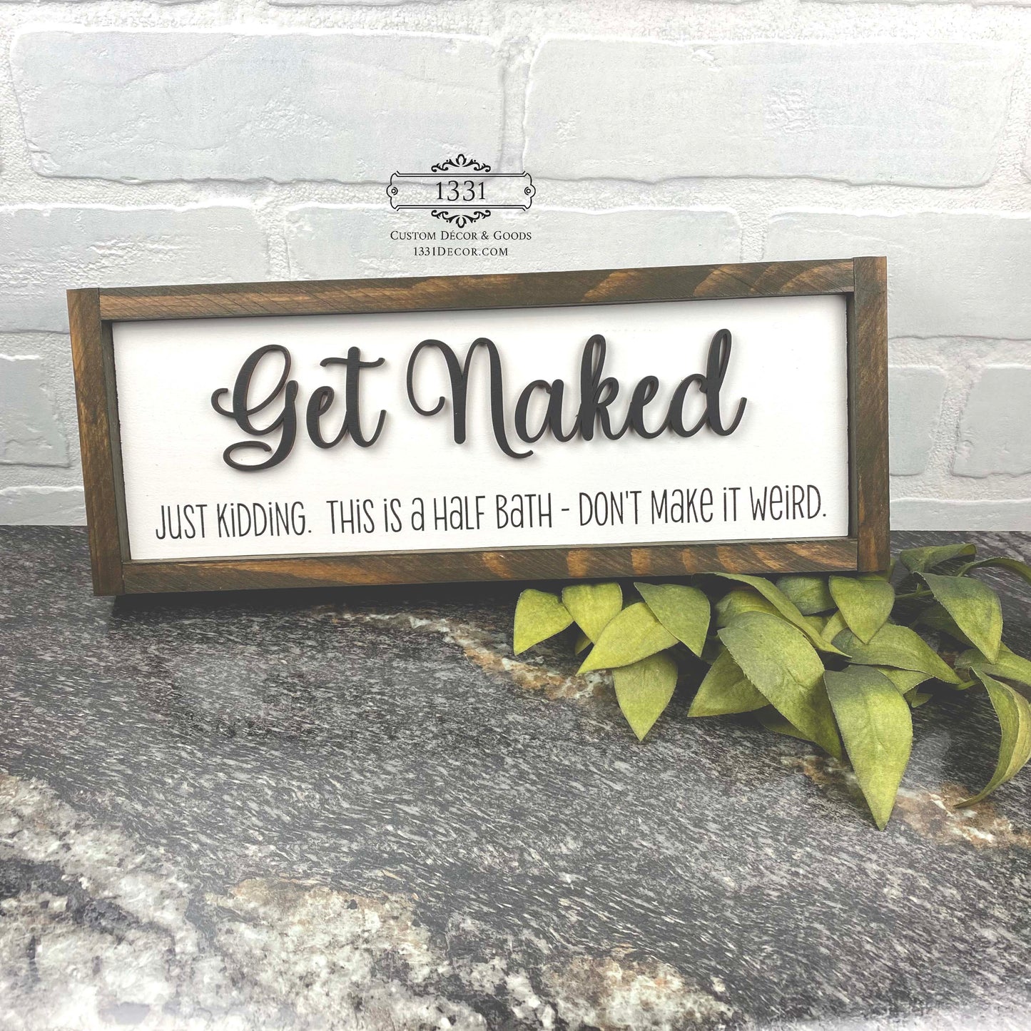 Get Naked, Just Kidding sign